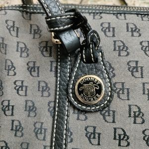 EUC Dooney and Bourke Gray material and black leather straps satchel bag